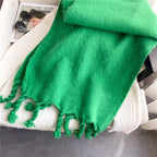 Détail du tricot en cachemire de l'écharpe
